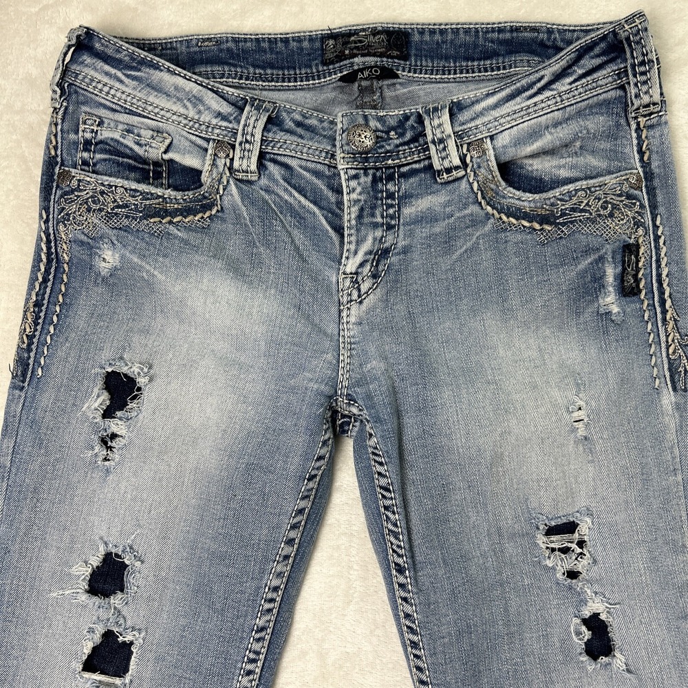 Silver Jeans Light Blue Distressed Boot Cut Jeans